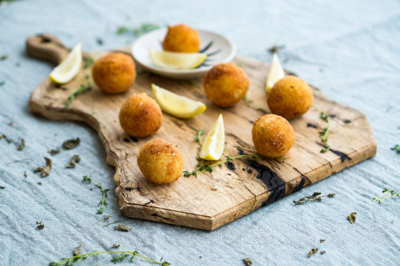 Arancini rice balls with mozzarella filling